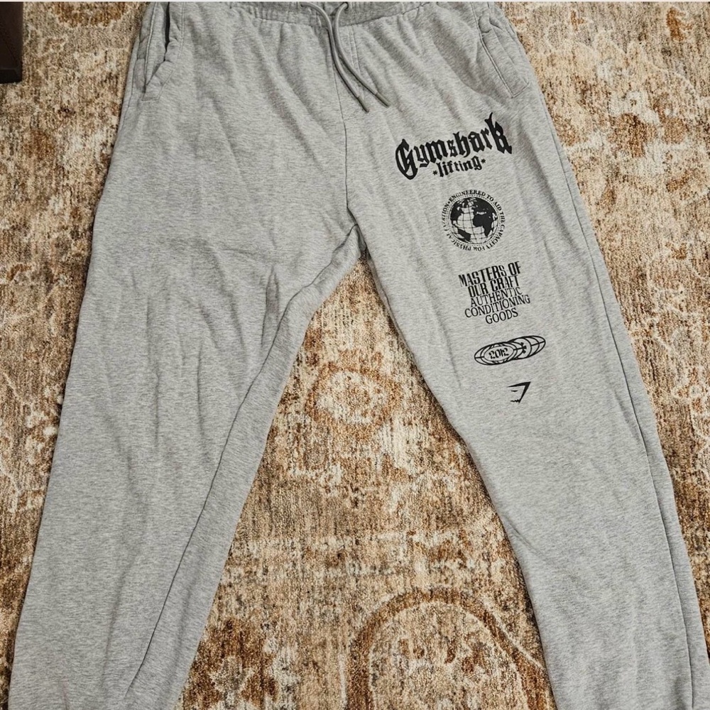 Gymshark Light Gray Sweatpants with Black Graphics